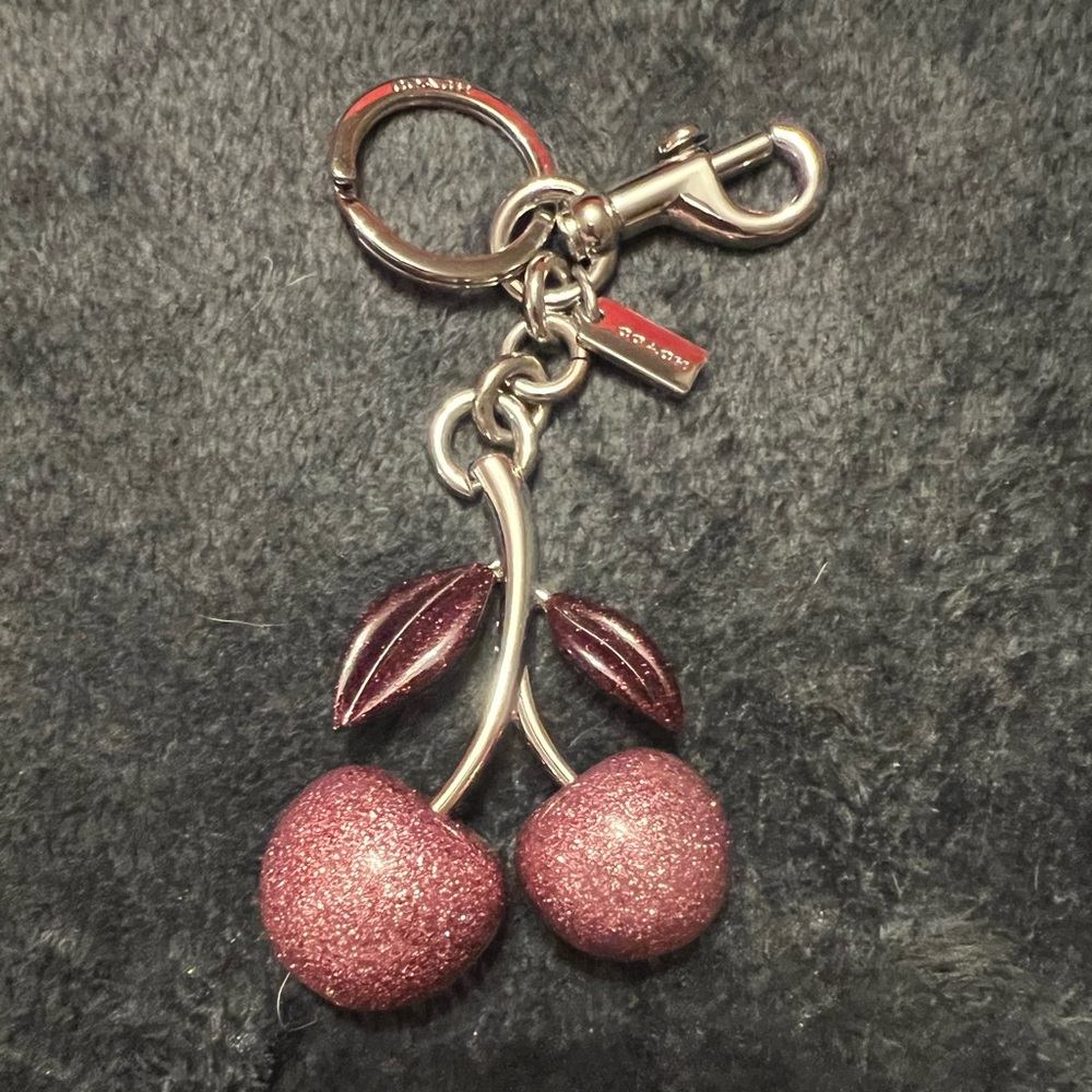 Coach pink and reds glittered cherry keychain